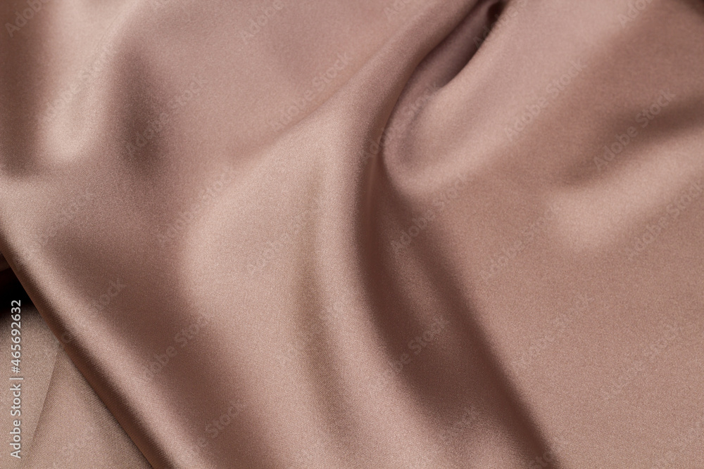 Fototapeta premium Texture of the fabric swirling in a whirlpool. cloth background. Web article template. Long header banner format. Sale coupon. Visit card. Your information. Text space.