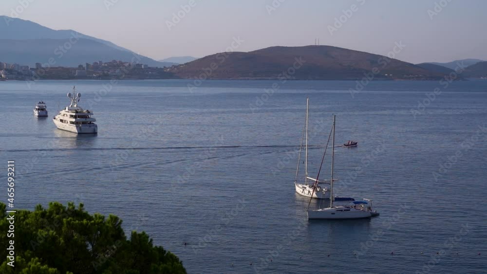Beautiful scenery early in the morning at harbor with parked yachts and boats, Slow Motion view Beautiful scenery early in the morning at harbor with parked yachts and boats, Slow Motion view
