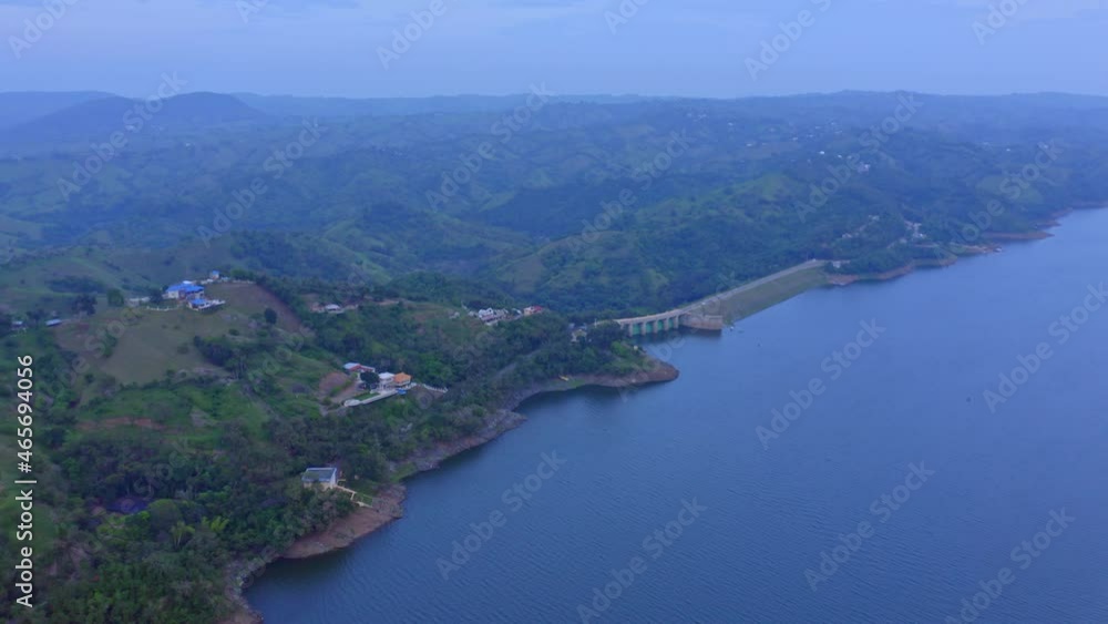 Panoramic View On Taveras Dam and Reservoir In Dominican Republic - aerial drone shot Panoramic View On Taveras Dam and Reservoir In Dominican Republic - aerial drone shot