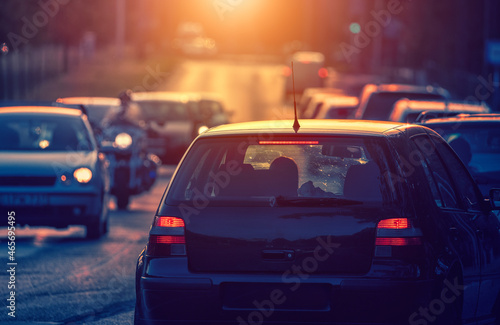 Heavy traffic, traffic jam in city at sunset