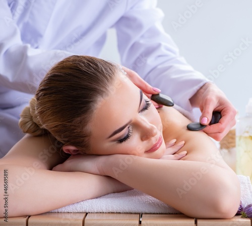 Woman during massage session in spa