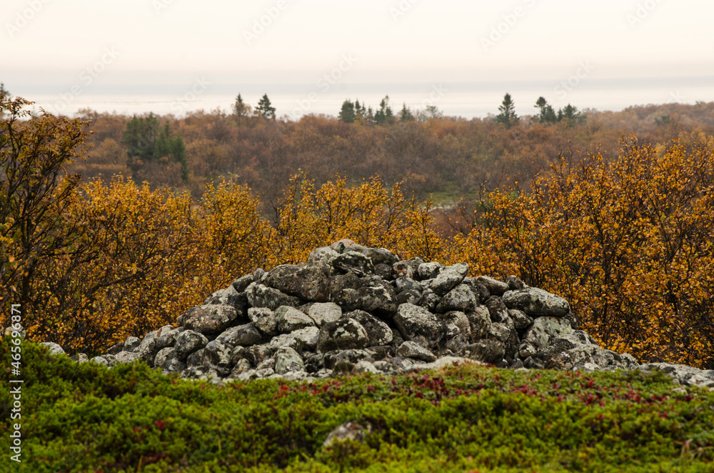 Stone piles among the tundra. Ancient graves. Solovki 