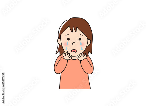 涙を流して悲しんでいる女の人
