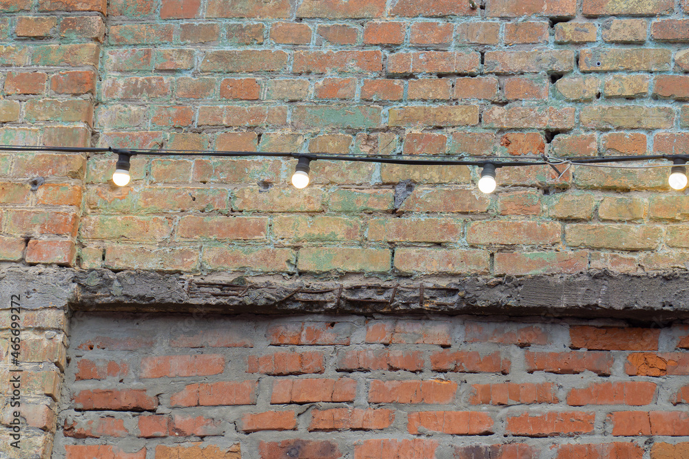 Fototapeta premium lighting an old building with lamps