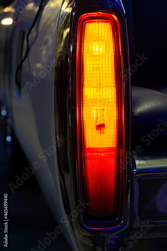 red rear light of the car. glowing car rear brake light