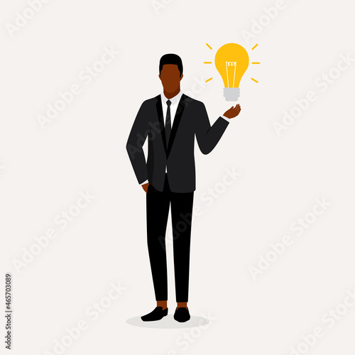 Black Businessman With Light Bulb Standing.