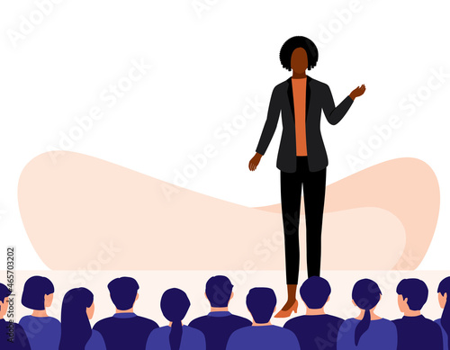 Black Female Public Speaker Giving Speech On Stage With Wide Audience.