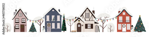 Vector illustration of winter street. Urban landscape with cute houses, trees in snow and christmas garlads, snowman. Flat buildings isolated on white background. 