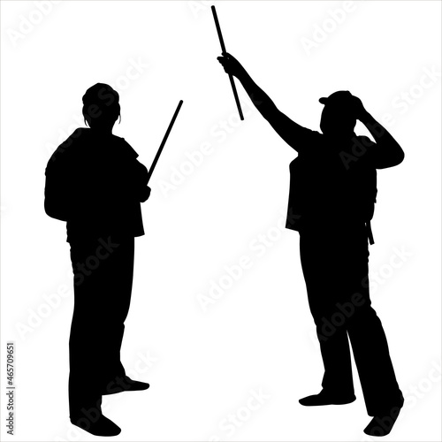 Black female silhouette in pants, with a backpack, in a cap isolated on white background. The woman stands motionless with a stick in her hand. The woman takes a step and raises the stick, the rope up