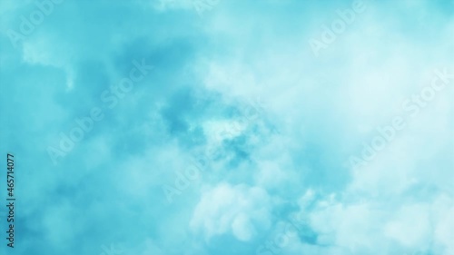 Passing Clouds Fly in the Light Blue Sky Loop. 3D rendering. Soft clouds fly in the blue sky background seamless loop animation. photo