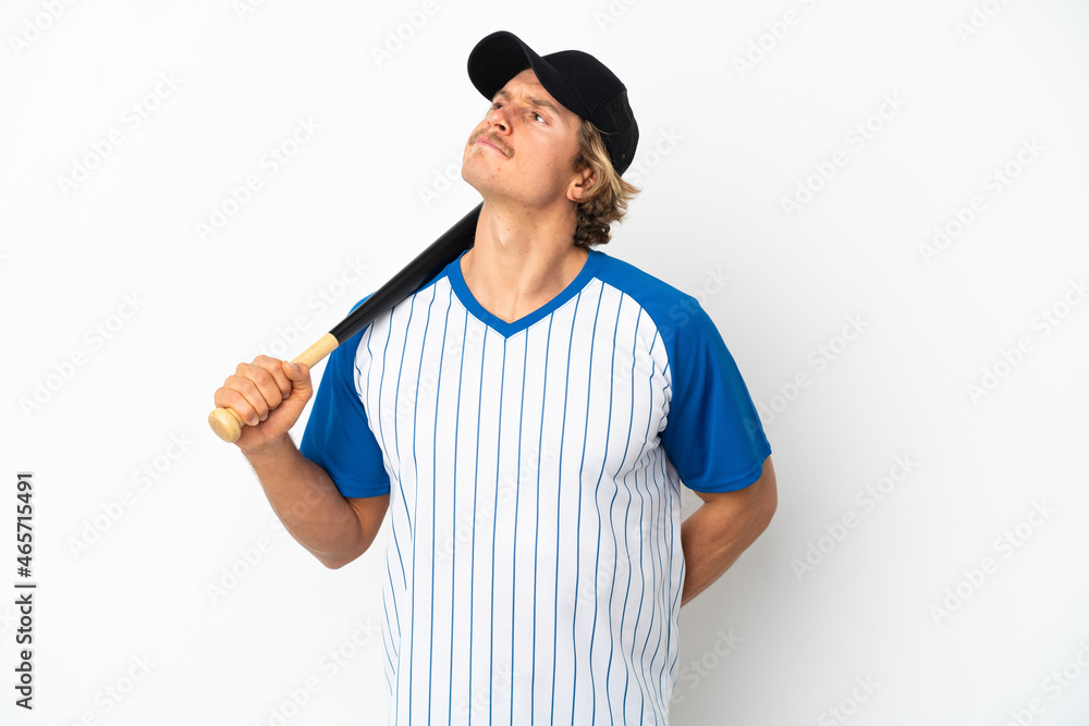 Young blonde man playing baseball isolated on white background and looking up Young blonde man playing baseball isolated on white background and looking up