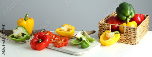 Fototapeta Naklejka Na Ścianę i Meble -  Concept of tasty food with bell pepper on white table