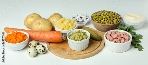 Ingredients for cooking Olivier salad on white background
