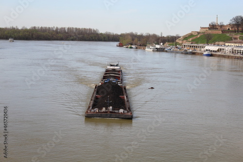 The big boath with coal on the river Sava