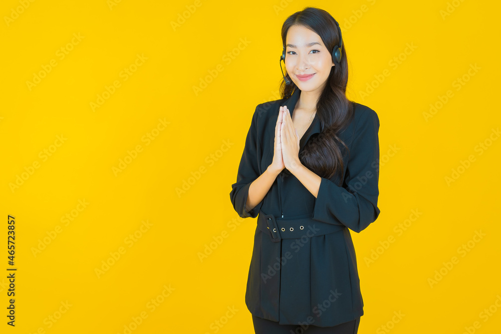 Portrait beautiful young asian woman with call center customer care service center Portrait beautiful young asian woman with call center customer care service center