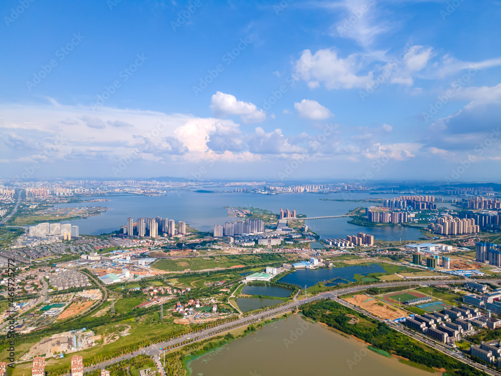 Fototapeta premium Aerial view of Wuhan city .Panoramic skyline and buildings beside yangtze river.