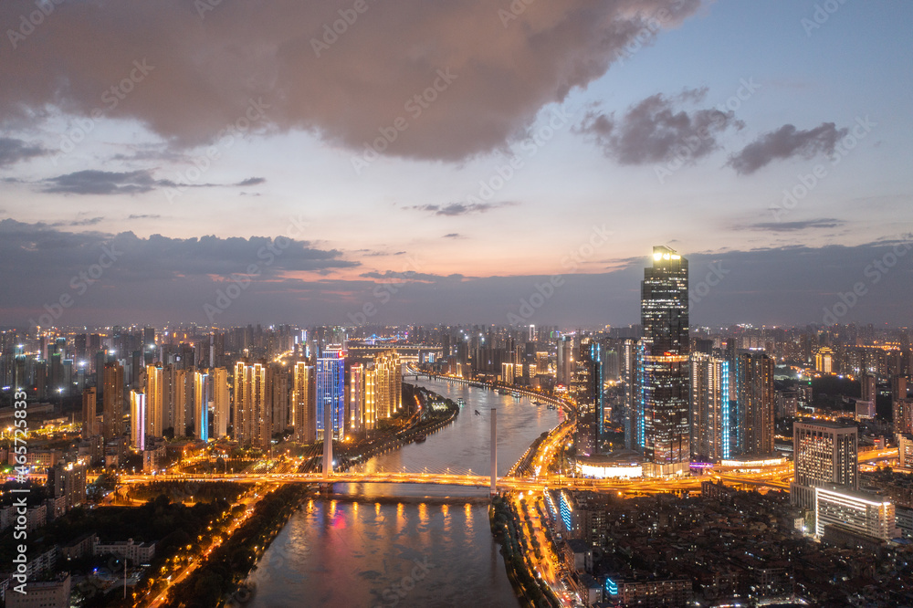 Fototapeta premium Wuhan skyline and Yangtze river with supertall skyscraper under construction in Wuhan Hubei China.