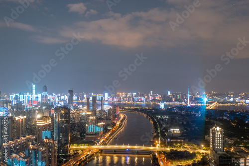 Wuhan skyline and Yangtze river with supertall skyscraper under construction in Wuhan Hubei China. 