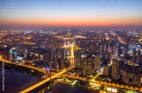 Wuhan skyline and Yangtze river with supertall skyscraper under construction in Wuhan Hubei China.  © AS_SleepingPanda