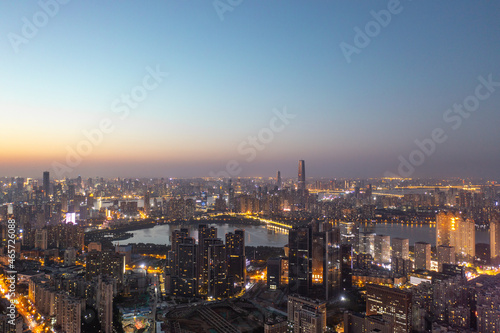 Wuhan skyline and Yangtze river with supertall skyscraper under construction in Wuhan Hubei China. 