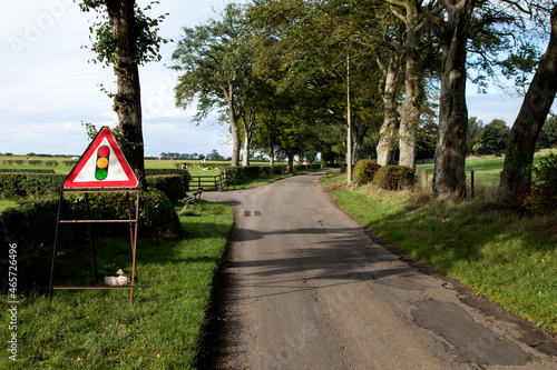 Temporary Traffic Lights Sign on a Country Road photo