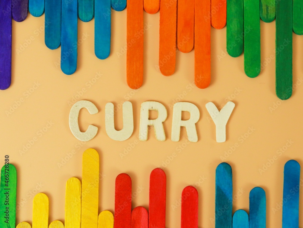 Terengganu, Malaysia-October 27,2021 :Wooden Curry Word With Blue Background