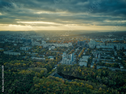 Aerial over the city in autumn at sunset. Kihinev city, Moldova republic of.