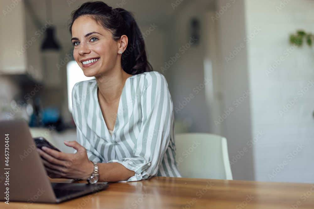 Fotografie Lovely businesswoman, enjoying her day at work