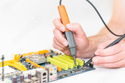 Computer Engineer hand, isolated over white studio background.Closeup.Selective focus.