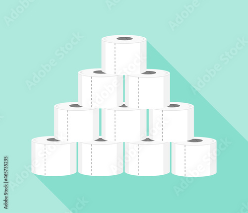 toilet paper rolls stacked on blue background