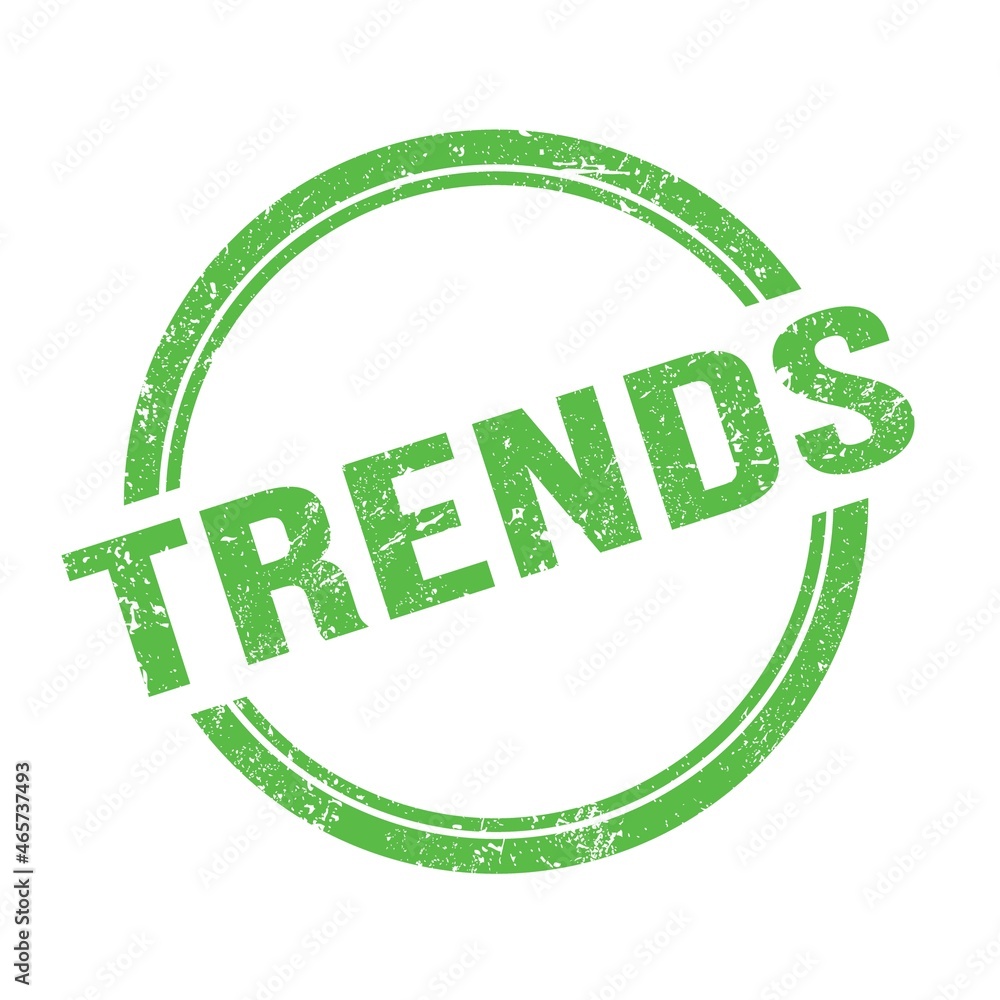 TRENDS text written on green grungy round stamp. TRENDS text written on green grungy round stamp.