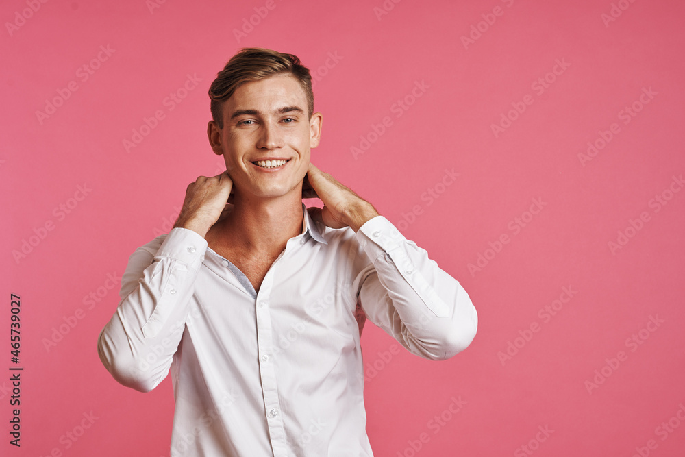 handsome man posing white shirt fashion self confidence pink background handsome man posing white shirt fashion self confidence pink background