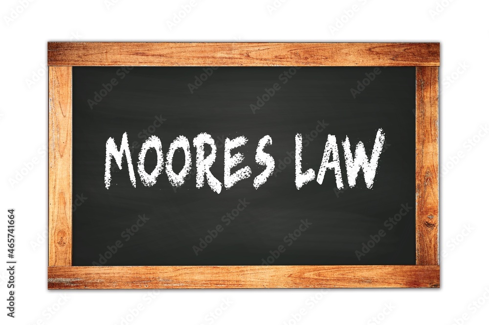 MOORES LAW text written on wooden frame school blackboard. MOORES LAW text written on wooden frame school blackboard.