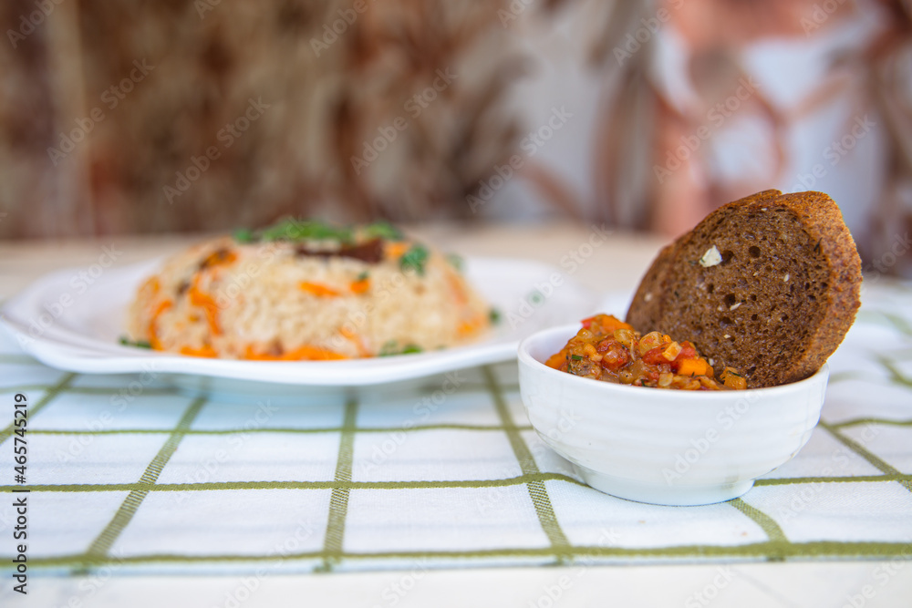 vegetable stew and pilaf on the table vegetable stew and pilaf on the table