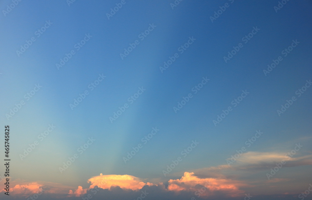 Photo set of clouds, sunset and the moon before dusk Photo set of clouds, sunset and the moon before dusk