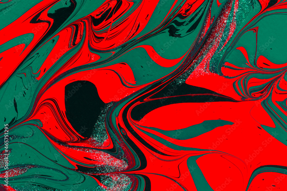 Red green acrylic fluid art abstract creative Christmas background. Artistic bright futuristic background. Dynamic lines, movement, splash contrast. Design of holiday cards. Fashionable marble texture