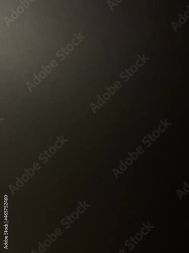 black blurred background with light angle