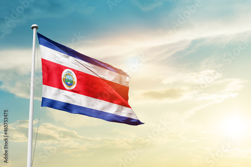Costa Rica national flag cloth fabric waving on the sky - Image photo