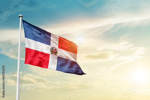 Canvas Print Dominican Republic national flag cloth fabric waving on the sky - Image