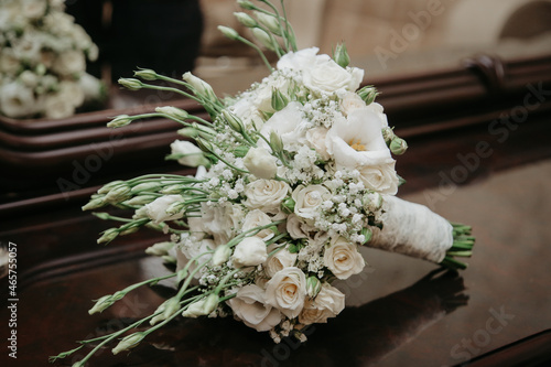 Close view bride bouquet.  Modern wedding bouquet on table.