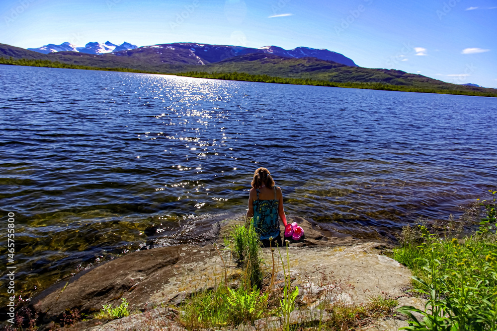 Fototapeta premium person on the beach, Tustevannet, North, Norway