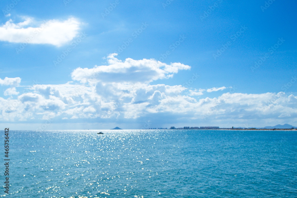 Nice seascape with boats going through the surf in vacation time Nice seascape with boats going through the surf in vacation time