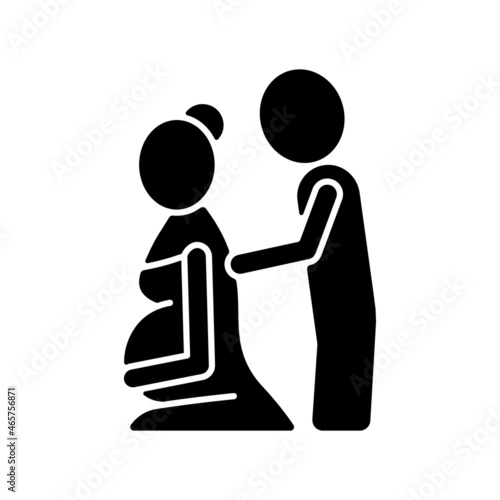 Pregnancy massage black glyph icon. Relaxing expecting mother body. Prenatal massage therapy. Relieving muscle aches in back and neck. Silhouette symbol on white space. Vector isolated illustration