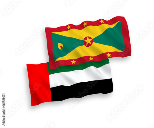 National vector fabric wave flags of Grenada and United Arab Emirates isolated on white background. 1 to 2 proportion.