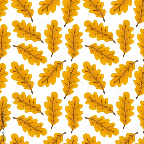 Seamless pattern of yellow oak leaves on a white background. For advertising, textiles, packaging