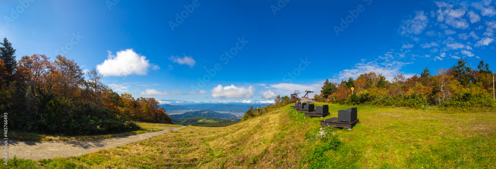 Viewpoint overlooking autumnal mountains and town (Zao, Yamagata, Japan)
