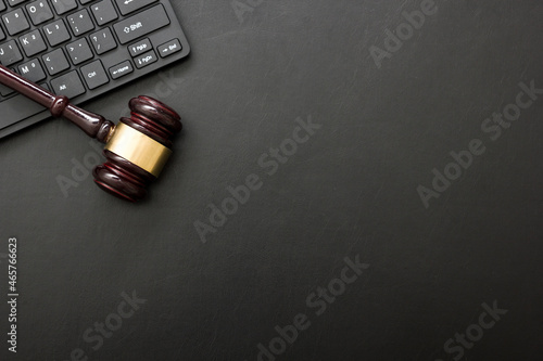 Judge gavel with computer keyboard. Concept of internet crime. Copy space for text
