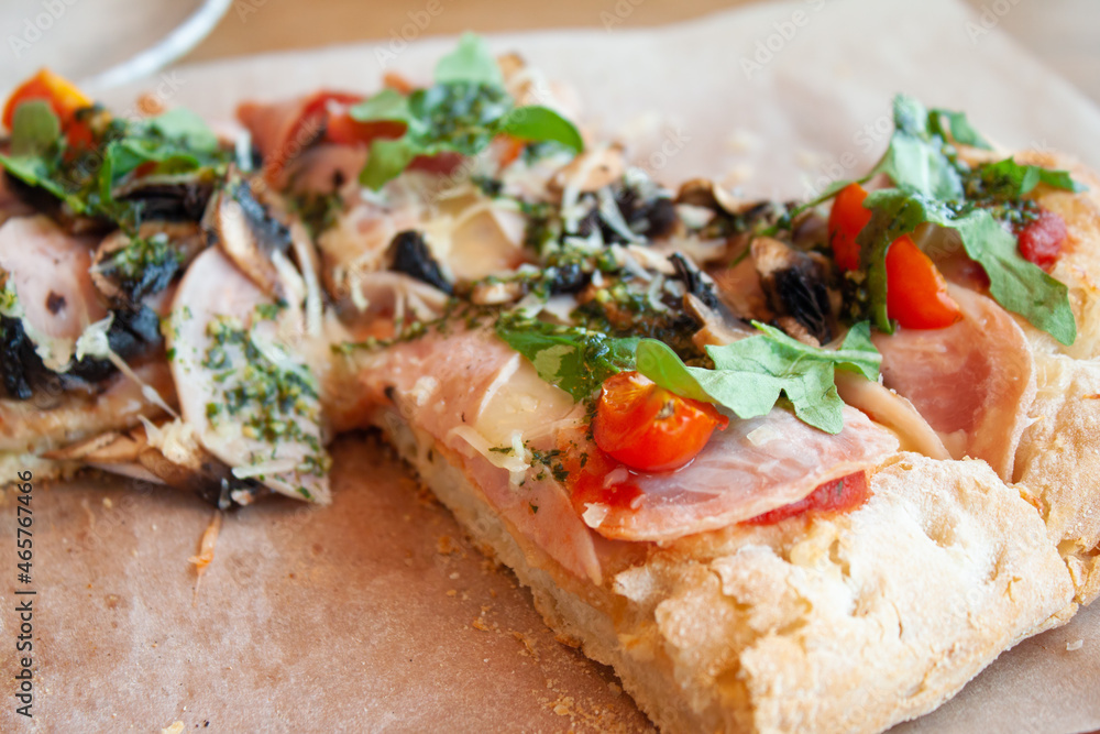 Delicious italian pizza served on wooden table. Delicious italian pizza served on wooden table.