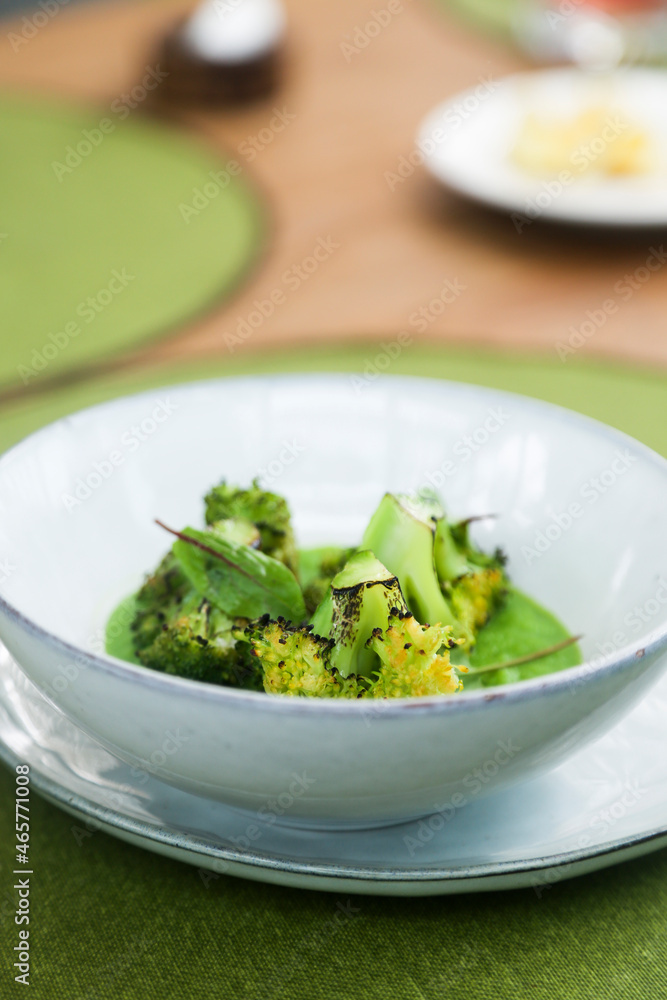 Roasted broccoli with pea puree