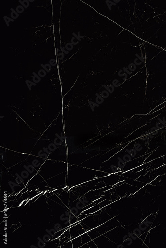 Black marble, patterned background texture. © jozefklopacka